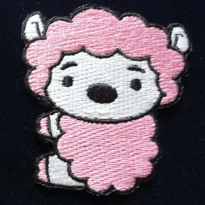 密绣工艺的精湛之旅 浅析利诚实业全密绣章的生产工艺与商业价值
